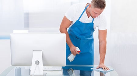 Janitor cleaning office