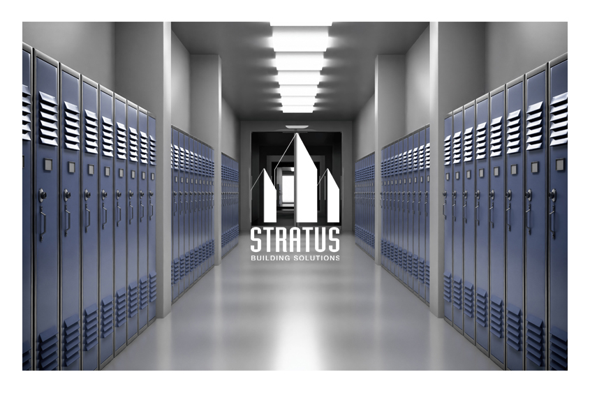 A Long Tiled Hallway in a School with Turquoise Lockers on Both Sides and Chairs Stacked on Top of Each Other in the Distance.