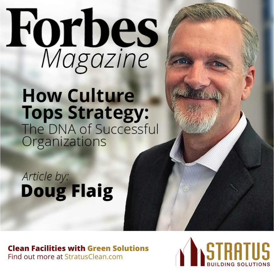 Doug Flaig to the Right with the Text Forbes Magazine and a Blurry Office Reception Area in the Background