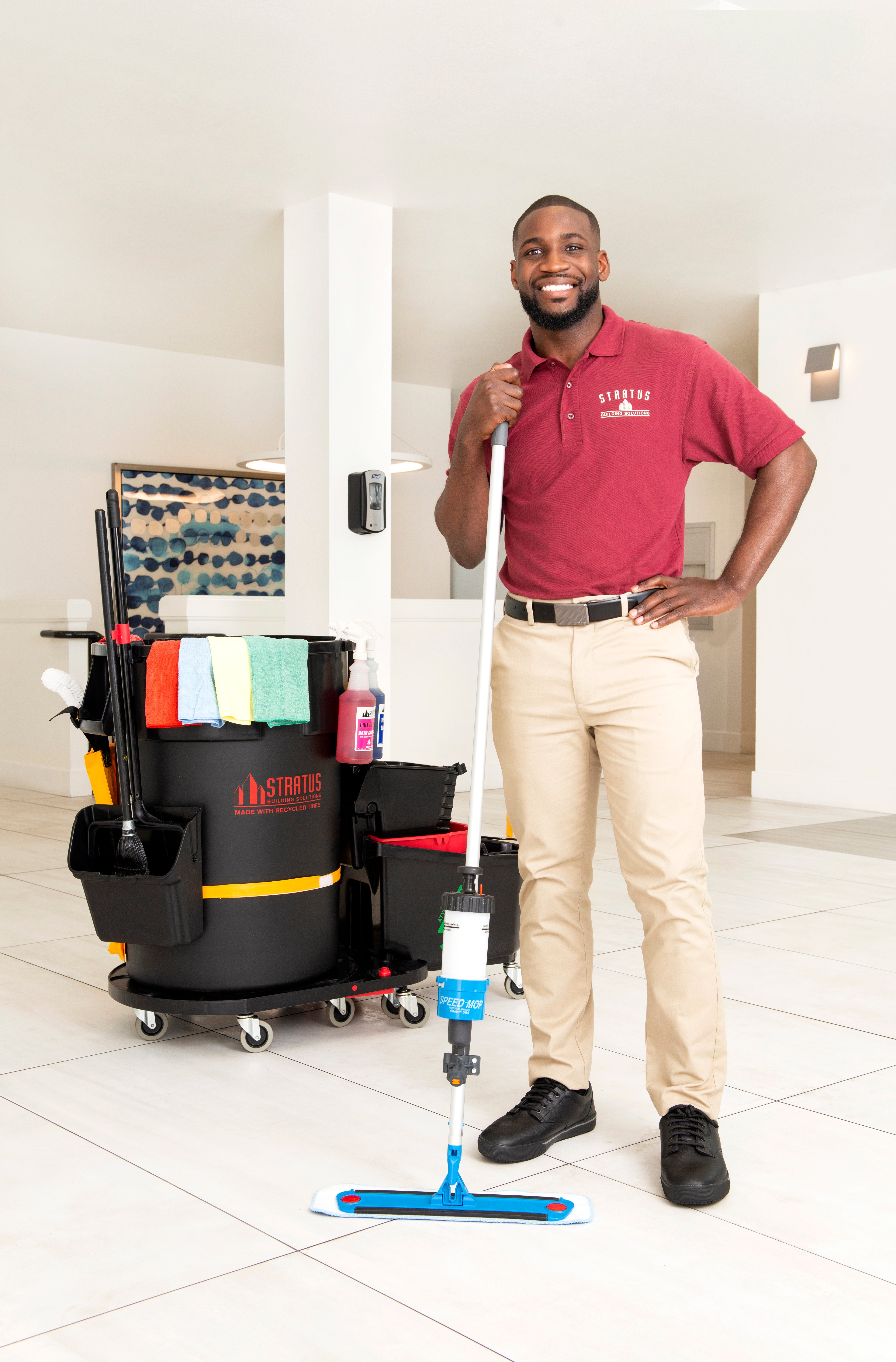 franchise owner standing next to supplies