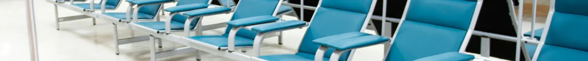 The Waiting Room for a Dialysis Center with Blue Empty Chairs and a Clean Floor