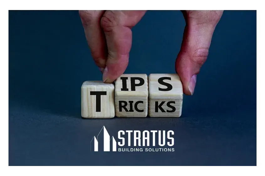 Three cubes, the first with the letter T and the next two poised to convey TIPS and TRICKS.